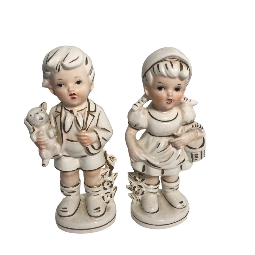 Vintage Tii Japan boy/girl porcelain figurines- 7.5”